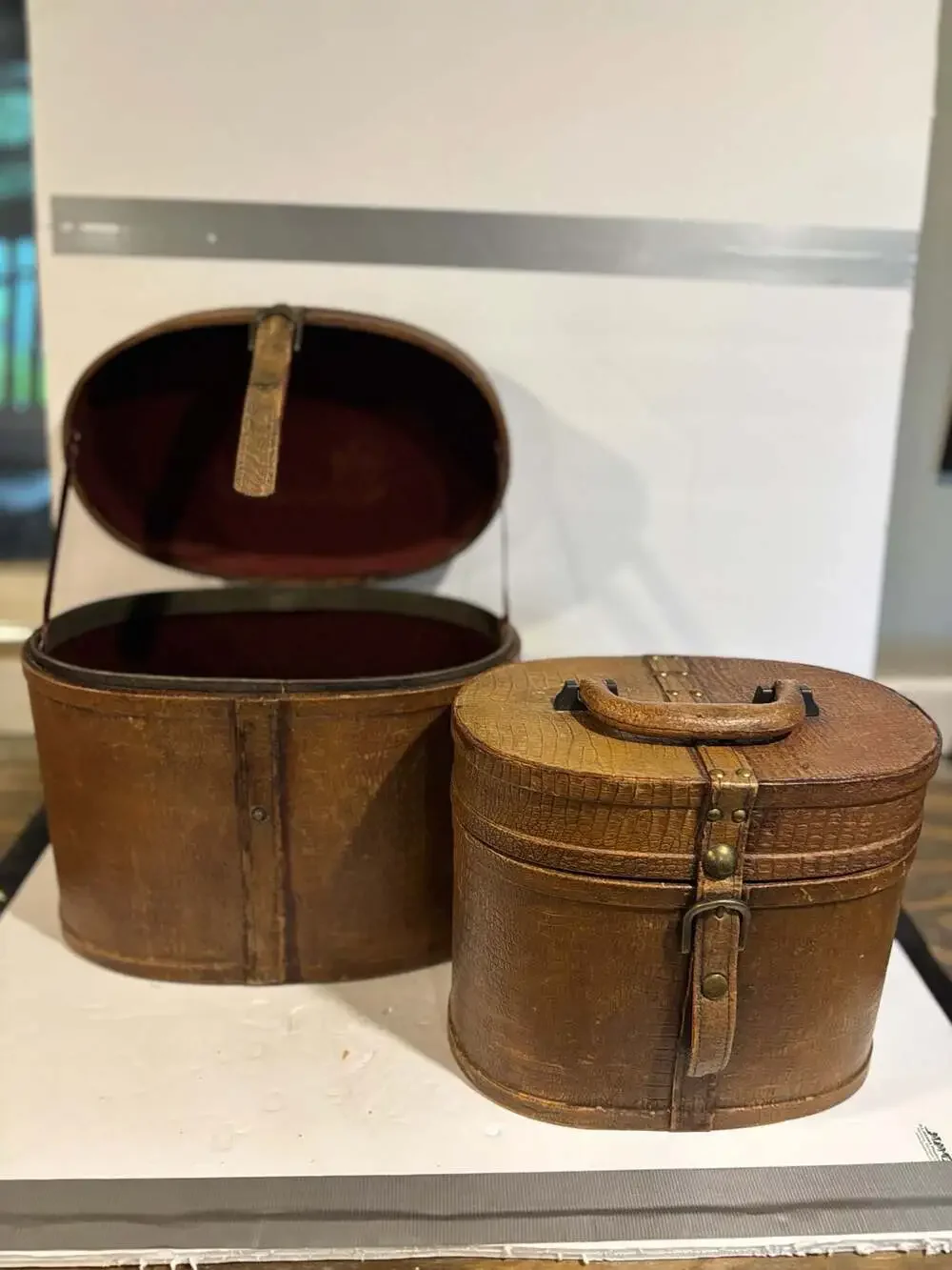 Vintage Oval Leather Hat Box with Brass Buckle and Burgundy Lining